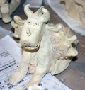 Looking a bit cow like student dragon clay project