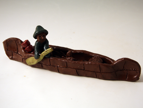 Voyageur in canoe clay project for kids